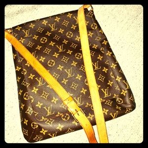 Authentic Louis Vuitton messenger with dust bag